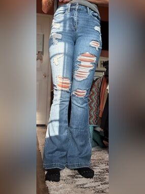 Distressed Light Blue Flare Jeans for Women